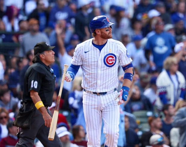 Chicago Cubs catcher Carson Kelly (15) hits his second home run of the game against the Washinton Nationals at Wrigley Field on Sept. 7, 2025, in Chicago. (Stacey Wescott/Chicago Tribune)