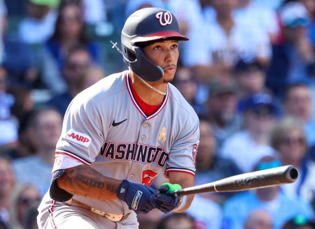 Washington Nationals outfielder Daylen Lile (51) triples in the top of the ninth inning against the Chicago Cubs at Wrigley Field on Sept. 7, 2025, in Chicago. (Stacey Wescott/Chicago Tribune)