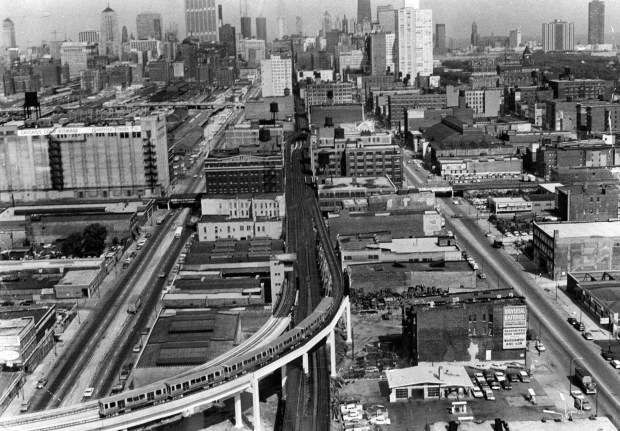 A modern rapid transit train heads for the Loop carrying dignitaries as the city dedicates a $51 million-dollar system in the Dan Ryan expressway on Sept. 26, 1969. The train has just left the Dan Ryan system and is linking up with the Lake Street line into the Loop. (James O'Leary/Chicago Tribune)