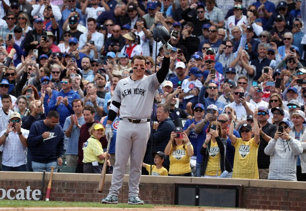 Yankees first baseman Anthony Rizzo salutes the crowd before batting against the Cubs in the second inning at Wrigley Field on Sept. 6, 2024. (Terrence Antonio James/Chicago Tribune)