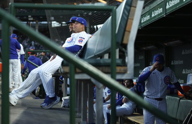 Cubs outfielder Kevin Alcántara, left, and designated hitter Moisés Ballesteros talk in the dugout before a game against the Mets at Wrigley Field on Sept. 25, 2025, in Chicago. (John J. Kim/Chicago Tribune)