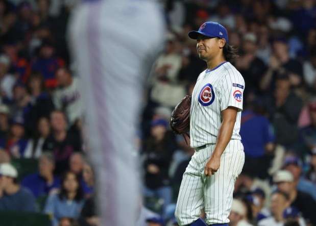 Cubs starting pitcher Shota Imanaga grimaces after giving up a two-run double to Mets center fielder Tyrone Taylor in the sixth inning at Wrigley Field on Sept. 25, 2025, in Chicago. (John J. Kim/Chicago Tribune)