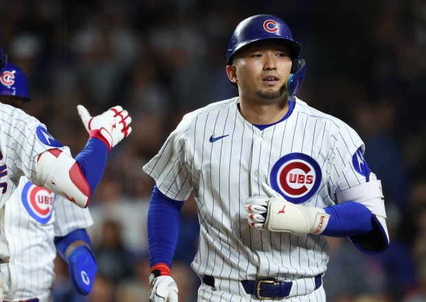 Cubs right fielder Seiya Suzuki heads to the dugout after hitting a three-run home run in the sixth inning against the Mets at Wrigley Field on Sept. 25, 2025, in Chicago. (John J. Kim/Chicago Tribune)