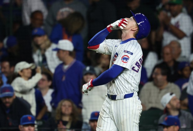 Cubs center fielder Pete Crow-Armstrong covers his mouth after flying out to right field in the ninth inning against the Mets at Wrigley Field on Sept. 25, 2025, in Chicago. (John J. Kim/Chicago Tribune)
