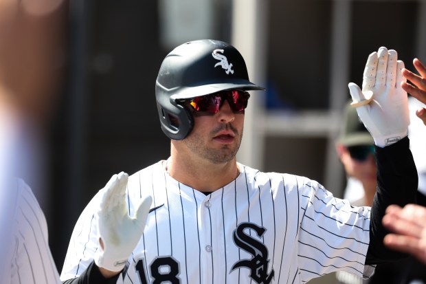 Chicago White Sox outfielder Mike Tauchman (18) gets high-fives after hitting a home run during the fourth inning against the Baltimore Orioles at Rate Field on Wednesday, Sept. 17, 2025. (Eileen T. Meslar/Chicago Tribune)