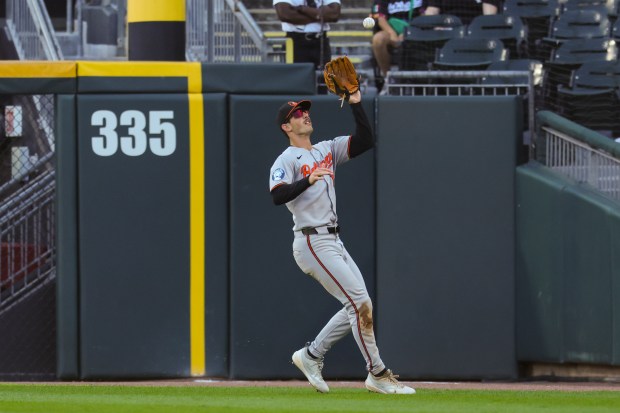 Baltimore Orioles outfielder Dylan Beavers (12) catches a fly ball during the eighth inning against the Chicago White Sox at Rate Field on Wednesday, Sept. 17, 2025. (Eileen T. Meslar/Chicago Tribune)