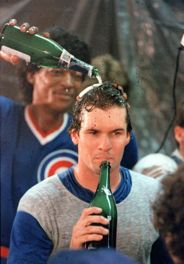 Ryne Sandberg sips champagne in the clubhouse after the Cubs beat the Pirates to clinch the National League East title Sept. 24, 1984. (Charles Cherney/Chicago Tribune)