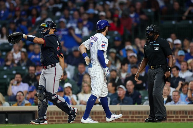 Chicago Cubs shortstop Dansby Swanson (7) talks with the umpire after striking out during the second inning against the Atlanta Braves at Wrigley Field Wednesday Sept. 3, 2025, in Chicago. (Armando L. Sanchez/Chicago Tribune)