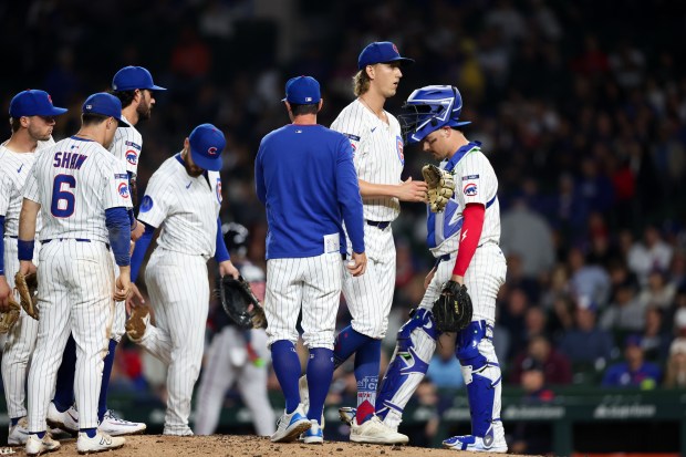 Chicago Cubs manager Craig Counsell (11) takes out Chicago Cubs pitcher Ben Brown (32) during the seventh inning against the Atlanta Braves at Wrigley Field Wednesday Sept. 3, 2025, in Chicago. (Armando L. Sanchez/Chicago Tribune)