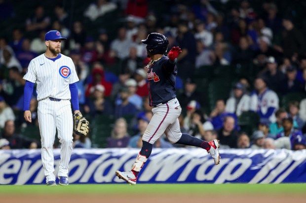 Atlanta Braves second base Ozzie Albies (1) runs the bases after hitting a solo-homer during the eighth inning against the Chicago Cubs at Wrigley Field Wednesday Sept. 3, 2025, in Chicago. (Armando L. Sanchez/Chicago Tribune)