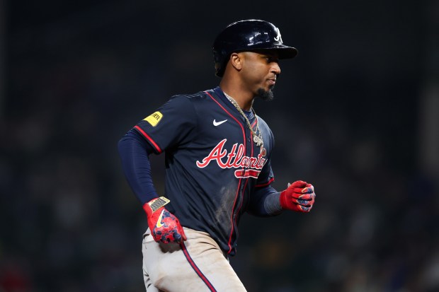 Atlanta Braves second base Ozzie Albies (1) runs the bases after hitting a solo-homer during the eighth inning against the Chicago Cubs at Wrigley Field Wednesday Sept. 3, 2025, in Chicago. (Armando L. Sanchez/Chicago Tribune)