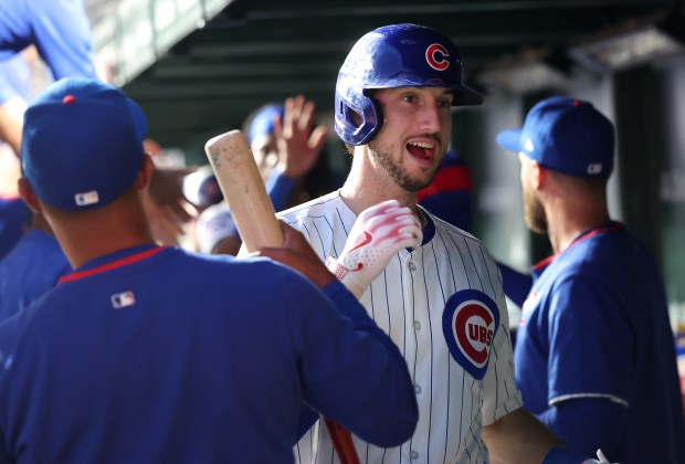 Chicago Cubs right fielder Kyle Tucker is congratulated by his teammates in the dugout after hitting a 3-run home run in the third inning of a game against the Atlanta Braves at Wrigley Field in Chicago on Sept. 2, 2025. (Chris Sweda/Chicago Tribune)