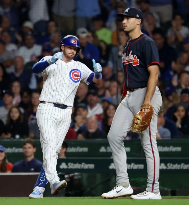 Chicago Cubs left fielder Ian Happ celebrates after driving in a run on single in the third inning of a game against the Atlanta Braves at Wrigley Field in Chicago on Sept. 2, 2025. (Chris Sweda/Chicago Tribune)