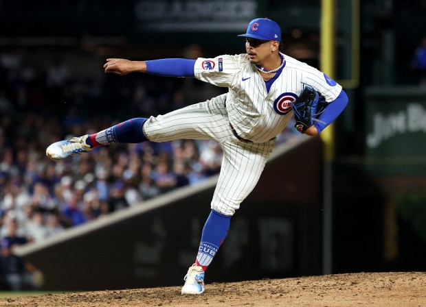 Chicago Cubs relief pitcher Daniel Palencia (48) follows through on a pitch to the Atlanta Braves in the ninth inning of a game at Wrigley Field in Chicago on Sept. 2, 2025. (Chris Sweda/Chicago Tribune)