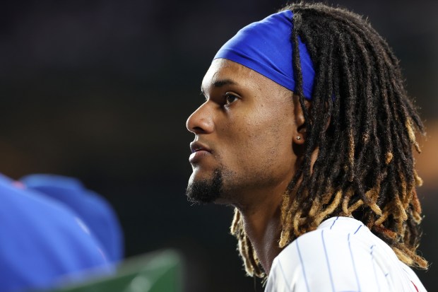 Chicago Cubs center fielder Kevin Alcántara (13) looks out from the dugout in the fourth inning of a game against the Atlanta Braves at Wrigley Field in Chicago on Sept. 2, 2025. (Chris Sweda/Chicago Tribune)