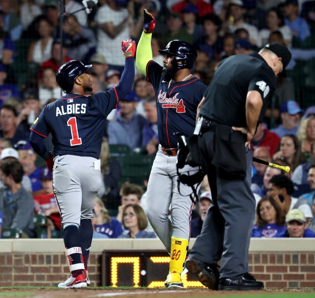 Atlanta Braves second baseman Ozzie Albies (1) celebrates after hitting a solo home run in the fourth inning of a game against the Chicago Cubs at Wrigley Field in Chicago on Sept. 2, 2025. (Chris Sweda/Chicago Tribune)