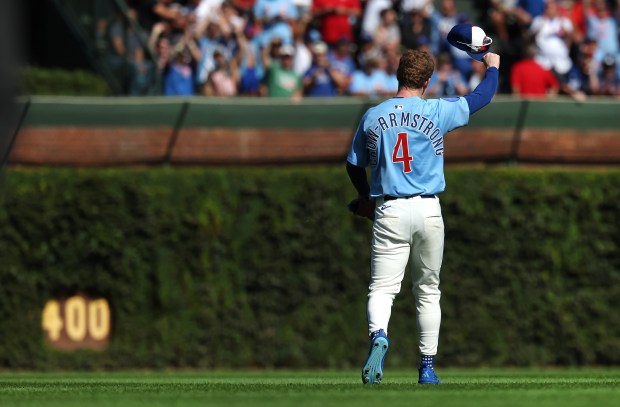 Chicago Cubs center fielder Pete Crow-Armstrong (4) acknowledges the fans as he goes out on defense after hitting a 2-run home run in the fourth inning of a game against the St. Louis Cardinals at Wrigley Field in Chicago on Sept. 26, 2025. (Chris Sweda/Chicago Tribune)