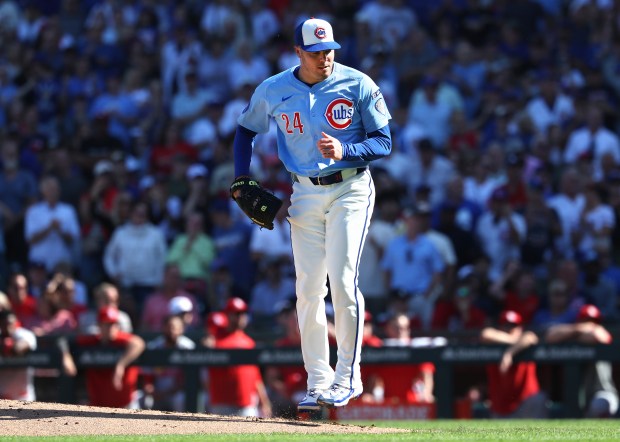 Chicago Cubs relief pitcher Caleb Thielbar (24) celebrates after shutting down the St. Louis Cardinals to end the top of the sixth inning at Wrigley Field in Chicago on Sept. 26, 2025. (Chris Sweda/Chicago Tribune)