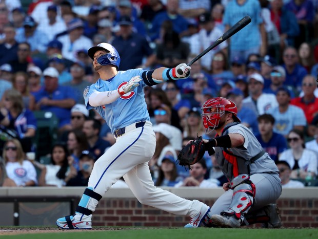 Chicago Cubs right fielder Seiya Suzuki hits a grand slam in the seventh inning of a game against the St. Louis Cardinals at Wrigley Field in Chicago on Sept. 26, 2025. (Chris Sweda/Chicago Tribune)