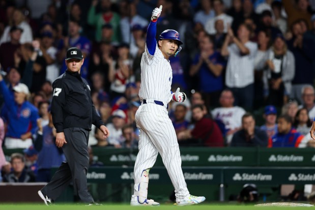 Chicago Cubs outfielder Seiya Suzuki (27) celebrates after hitting a RBI single during the sixth inning against the New York Mets at Wrigley Field Tuesday Sept. 23, 2025, in Chicago. (Armando L. Sanchez/Chicago Tribune)