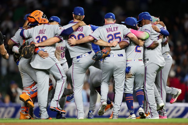 New York Mets players celebrate after defeating the Chicago Cubs, 9-7, at Wrigley Field Tuesday Sept. 23, 2025, in Chicago. (Armando L. Sanchez/Chicago Tribune)