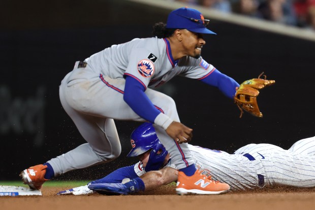 Chicago Cubs third baseman Matt Shaw steals second base in the sixth inning of a game against the New York Mets at Wrigley Field in Chicago on Sept. 24, 2025. (Chris Sweda/Chicago Tribune)