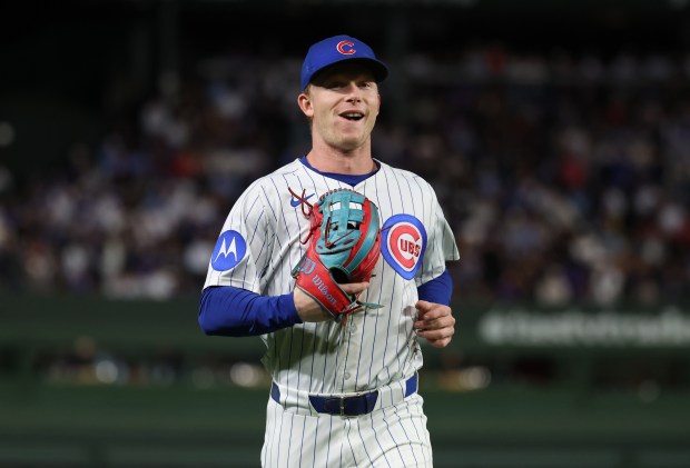 Chicago Cubs center fielder Pete Crow-Armstrong (4) flashes a smile as he runs in from the outfield in the fourth inning of a game against the New York Mets at Wrigley Field in Chicago on Sept. 24, 2025. (Chris Sweda/Chicago Tribune)