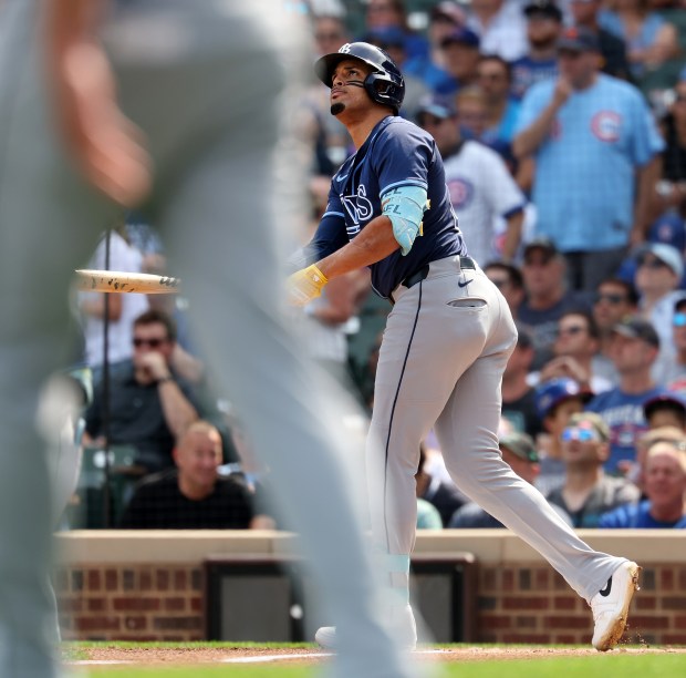 Tampa Bay Rays designated hitter Christopher Morel watches the flight of his 3-run home run in the first inning of a game against the Chicago Cubs at Wrigley Field in Chicago on Sept. 12, 2025. (Chris Sweda/Chicago Tribune)