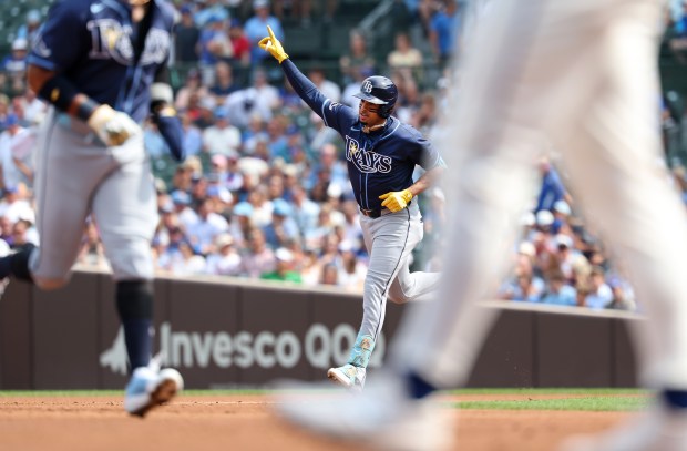 Tampa Bay Rays designated hitter Christopher Morel rounds the bases after hitting a 3-run home run in the first inning of a game against the Chicago Cubs at Wrigley Field in Chicago on Sept. 12, 2025. (Chris Sweda/Chicago Tribune)