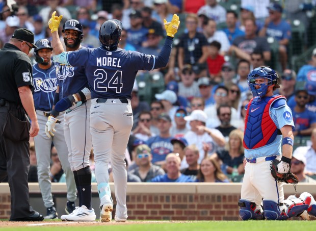 Tampa Bay Rays designated hitter Christopher Morel celebrates as he crosses home plate after hitting a 3-run home run in the first inning of a game against the Chicago Cubs at Wrigley Field in Chicago on Sept. 12, 2025. (Chris Sweda/Chicago Tribune)
