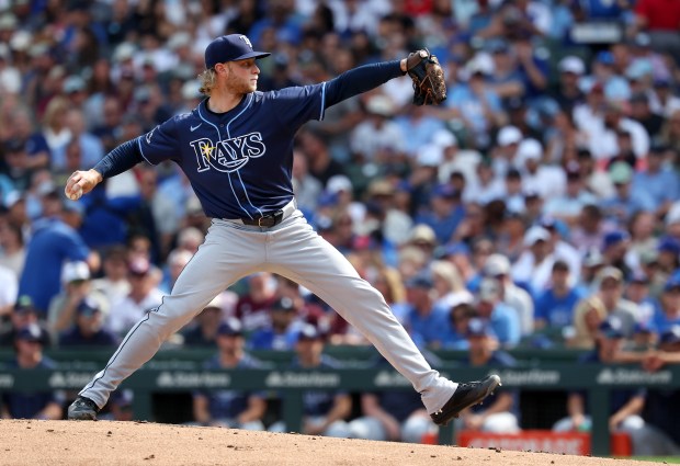 Tampa Bay Rays starting pitcher Shane Baz (11) delivers to the Chicago Cubs in the first inning of a game at Wrigley Field in Chicago on Sept. 12, 2025. (Chris Sweda/Chicago Tribune)