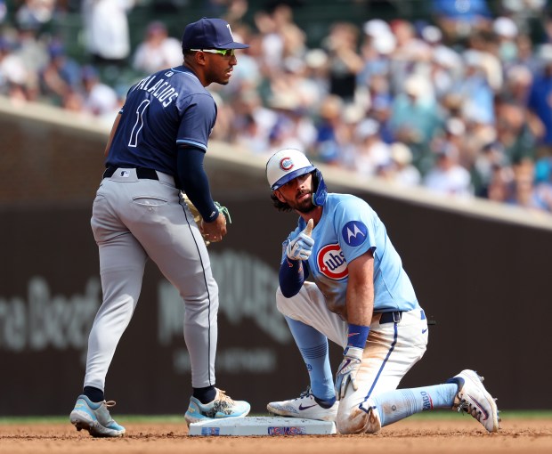 Chicago Cubs shortstop Dansby Swanson reacts after driving in a run on a double in the second inning of a game against the Tampa Bay Rays at Wrigley Field in Chicago on Sept. 12, 2025. (Chris Sweda/Chicago Tribune)