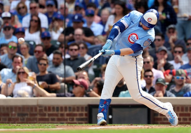 Chicago Cubs left fielder Ian Happ drives in a run on a single in the second inning of a game against the Tampa Bay Rays at Wrigley Field in Chicago on Sept. 12, 2025. (Chris Sweda/Chicago Tribune)