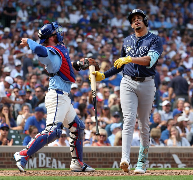 Tampa Bay Rays designated hitter Christopher Morel walks to the dugout after striking out in the third inning of a game against the Chicago Cubs at Wrigley Field in Chicago on Sept. 12, 2025. (Chris Sweda/Chicago Tribune)