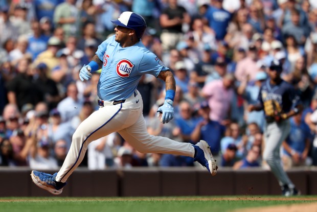Chicago Cubs designated hitter Moisés Ballesteros sprints around the bases on a run-scoring triple in the third inning of a game against the Tampa Bay Rays at Wrigley Field in Chicago on Sept. 12, 2025. (Chris Sweda/Chicago Tribune)