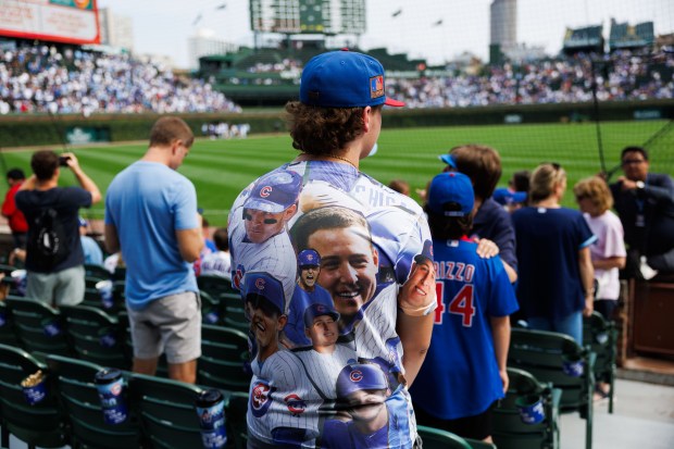 A fan wears an Anthony Rizzo shirt before the Cubs play the Tampa Bay Rays at Wrigley Field after the Cubs announced he would retire with the organization he helped lead to a World Series title in 2016 and become an ambassador for the team Saturday Sept. 13, 2025, in Chicago. (Armando L. Sanchez/Chicago Tribune)