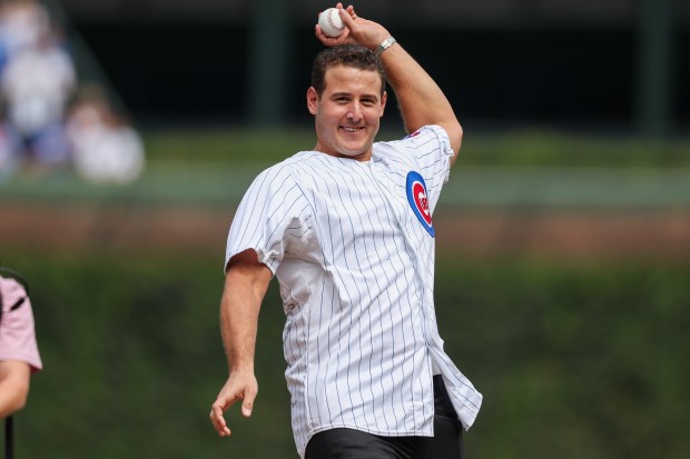 Former Cubs first baseman Anthony Rizzo throws out the first pitch before the Cubs play the Tampa Bay Rays at Wrigley Field after the Cubs announced he would retire and become an ambassador for the team he helped lead to a World Series in 2016 Saturday Sept. 13, 2025, in Chicago. (Armando L. Sanchez/Chicago Tribune)