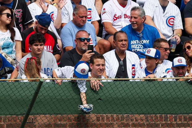 Former Cubs first baseman Anthony Rizzo sits in the bleachers while the Cubs play the Tampa Bay Rays at Wrigley Field Saturday Sept. 13, 2025, in Chicago. (Armando L. Sanchez/Chicago Tribune)
