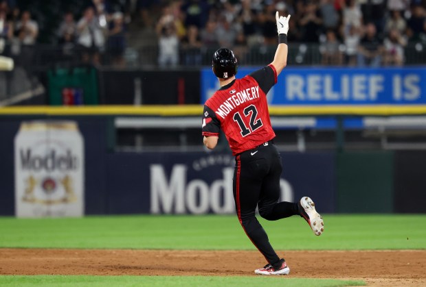 Chicago White Sox shortstop Colson Montgomery celebrates as he rounds the bases after hitting a two-run home run in the fifth inning of a game against the Minnesota Twins at Rate Field in Chicago on Aug. 22, 2025. (Chris Sweda/Chicago Tribune)