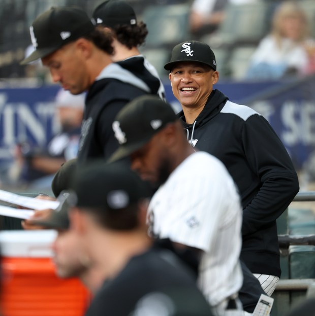 Chicago White Sox manager Will Venable flashes a smile in the dugout before the start of a game against the New York Yankees at Rate Field in Chicago on Aug. 28, 2025. (Chris Sweda/Chicago Tribune)