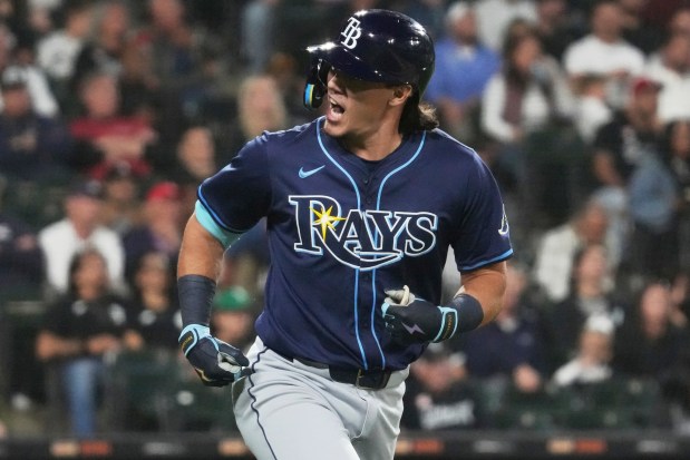 Tampa Bay Rays' Tristan Gray reacts as he rounds the bases after hitting a solo home run during the seventh inning of a baseball game against the Chicago White Sox in Chicago, Tuesday, Sept. 9, 2025. (AP Photo/Nam Y. Huh)