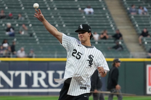 Chicago White Sox's Jaden Fauske who was the 44th overall pick in the 2025 MLB draft, throws out a ceremonial first pitch before a baseball game between the Tampa Bay Rays and the Chicago White Sox in Chicago, Tuesday, Sept. 9, 2025. (AP Photo/Nam Y. Huh)