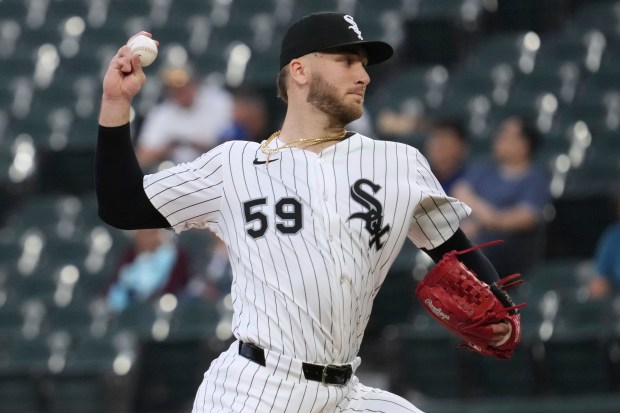 Chicago White Sox starting pitcher Sean Burke throws against the Tampa Bay Rays during the first inning of a baseball game in Chicago, Wednesday, Sept. 10, 2025. (AP Photo/Nam Y. Huh)