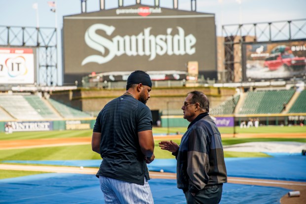 White Sox Chairman Jerry Reinsdorf talks with first baseman José Abreu before a game against the Guardians on May 9, 2022, at Guaranteed Rate Field. (Armando L. Sanchez/Chicago Tribune)