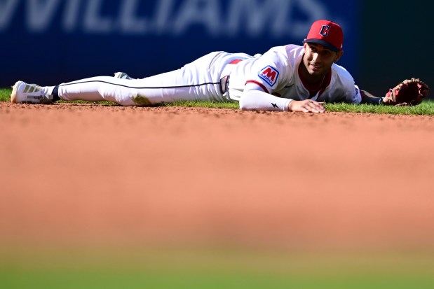 Guardians second basemen Brayan Rocchio smiles after throwing out the White Sox's Andrew Benintendi at first base in the ninth inning Sunday, Sept. 14, 2025, in Cleveland. (David Dermer/AP)