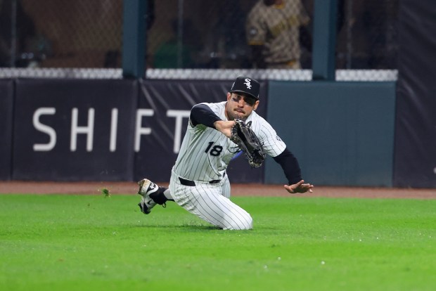 White Sox right fielder Mike Tauchman makes a sliding catch in the fifth inning against the Padres on Sept. 20, 2025, at Rate Field. (Justin Casterline/Getty Images)