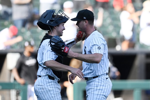White Sox reliever Jordan Leasure, right, celebrates with catcher Korey Lee after a 5-1 win over the Rays on Thursday, Sept. 11, 2025, at Rate Field. (Paul Beaty/AP)