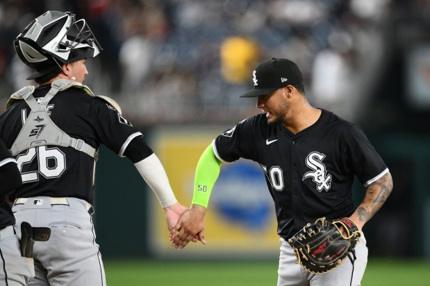 White Sox first baseman Lenyn Sosa, right, and Korey Lee celebrate after a 10-9 win against the Nationals on Friday, Sept. 26, 2025, in Washington. (Nick Wass/AP)