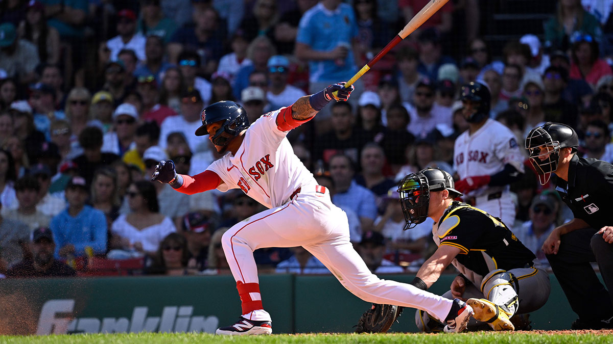 Boston Red Sox center fielder Ceddanne Rafaela (3) hits a one run RBI single during the sixth inning against the Pittsburgh Pirates at Fenway Park. 