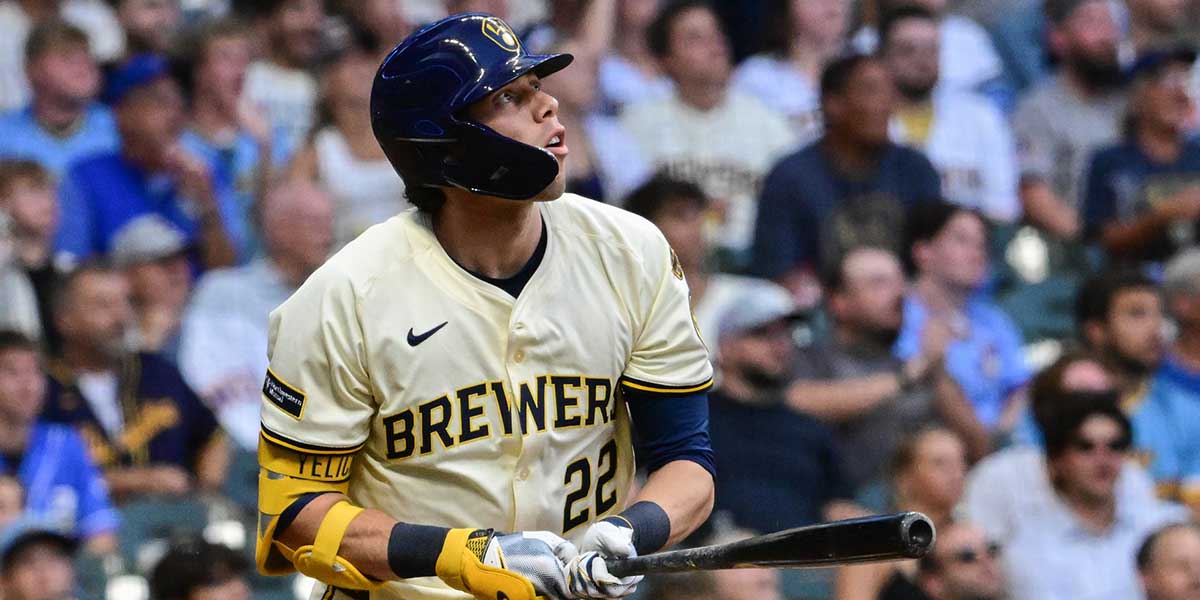 Milwaukee Brewers designated hitter Christian Yelich (22) hits a solo home run in the third inning against the Pittsburgh Pirates at American Family Field.